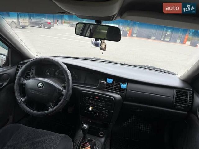 Черный Опель Вектра, объемом двигателя 2 л и пробегом 355 тыс. км за 3600 $, фото 5 на Automoto.ua