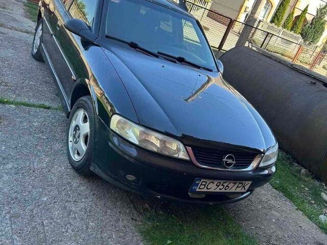Чорний Опель Вектра, об'ємом двигуна 2 л та пробігом 300 тис. км за 1999 $, фото 5 на Automoto.ua