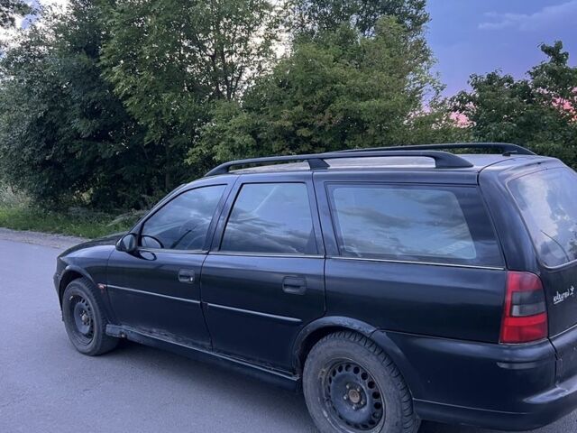 Черный Опель Вектра, объемом двигателя 2 л и пробегом 232 тыс. км за 953 $, фото 2 на Automoto.ua