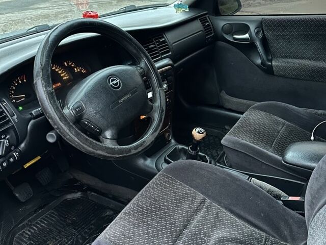 Черный Опель Вектра, объемом двигателя 2 л и пробегом 300 тыс. км за 1800 $, фото 9 на Automoto.ua