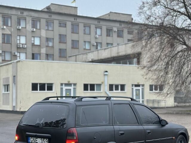 Черный Опель Вектра, объемом двигателя 2 л и пробегом 300 тыс. км за 1800 $, фото 3 на Automoto.ua