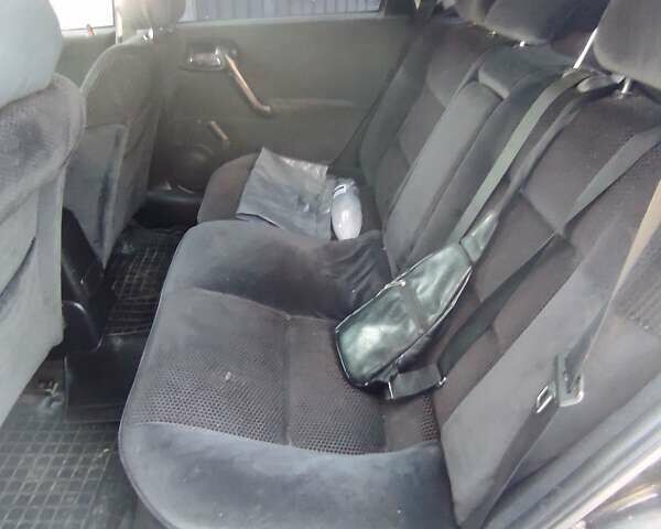 Чорний Опель Вектра, об'ємом двигуна 2 л та пробігом 343 тис. км за 2500 $, фото 8 на Automoto.ua