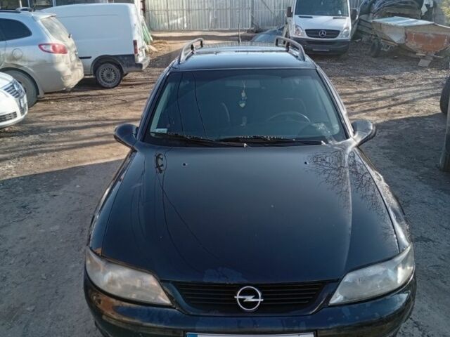 Черный Опель Вектра, объемом двигателя 2 л и пробегом 300 тыс. км за 3500 $, фото 1 на Automoto.ua