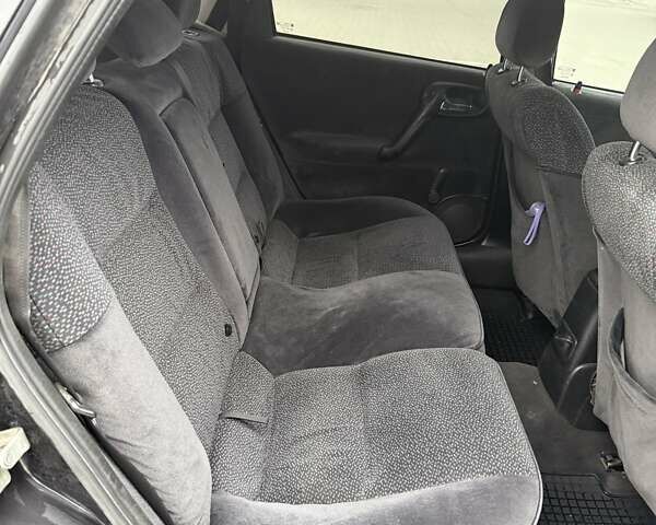 Черный Опель Вектра, объемом двигателя 2 л и пробегом 355 тыс. км за 3600 $, фото 7 на Automoto.ua