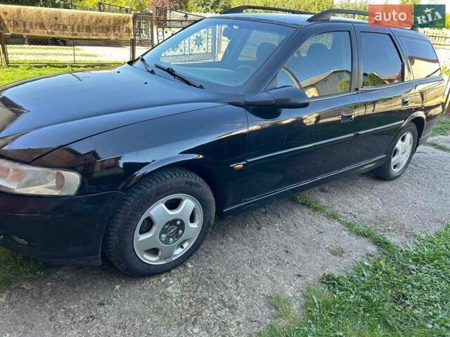 Чорний Опель Вектра, об'ємом двигуна 2 л та пробігом 300 тис. км за 1999 $, фото 6 на Automoto.ua