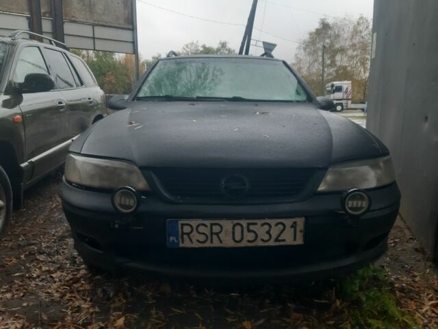 Черный Опель Вектра, объемом двигателя 2 л и пробегом 350 тыс. км за 1307 $, фото 1 на Automoto.ua