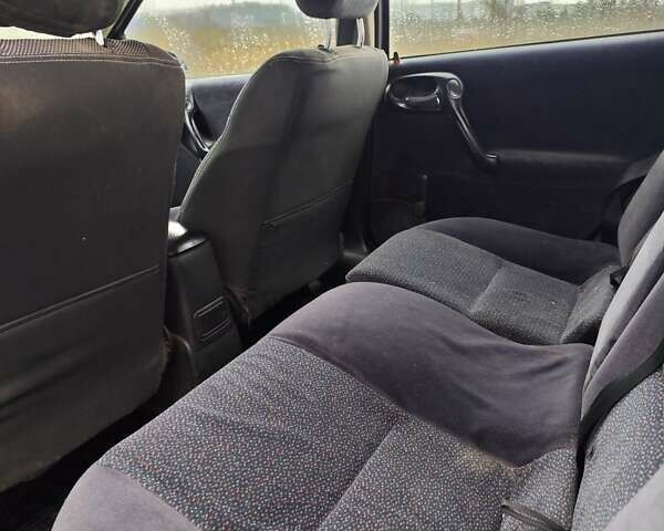 Черный Опель Вектра, объемом двигателя 1.6 л и пробегом 333 тыс. км за 1999 $, фото 9 на Automoto.ua