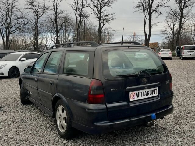 Черный Опель Вектра, объемом двигателя 0 л и пробегом 200 тыс. км за 1999 $, фото 4 на Automoto.ua