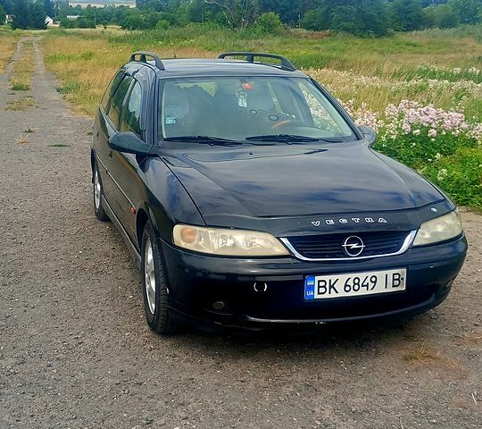 Черный Опель Вектра, объемом двигателя 2 л и пробегом 378 тыс. км за 2600 $, фото 4 на Automoto.ua