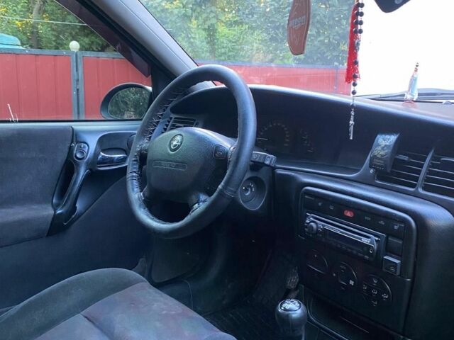 Чорний Опель Вектра, об'ємом двигуна 1.8 л та пробігом 258 тис. км за 2300 $, фото 10 на Automoto.ua