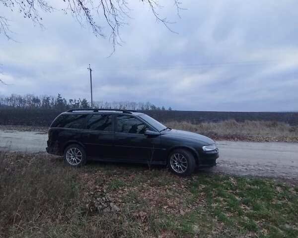 Черный Опель Вектра, объемом двигателя 2.2 л и пробегом 400 тыс. км за 2500 $, фото 1 на Automoto.ua