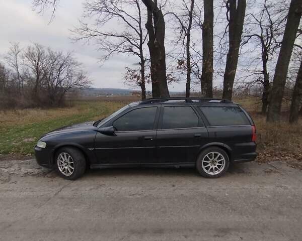 Черный Опель Вектра, объемом двигателя 2.2 л и пробегом 400 тыс. км за 2500 $, фото 2 на Automoto.ua