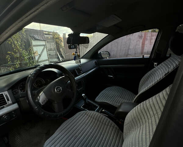 Черный Опель Вектра, объемом двигателя 2.22 л и пробегом 290 тыс. км за 4000 $, фото 2 на Automoto.ua