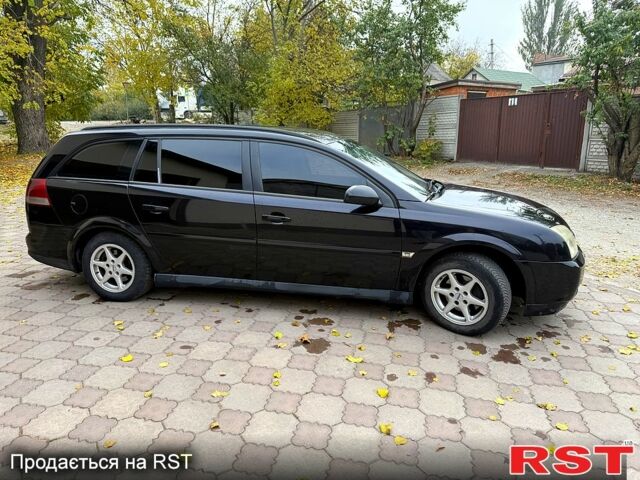 Черный Опель Вектра, объемом двигателя 2.2 л и пробегом 333 тыс. км за 3000 $, фото 3 на Automoto.ua