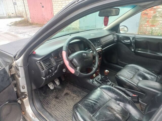 Чорний Опель Вектра, об'ємом двигуна 2 л та пробігом 270 тис. км за 1500 $, фото 4 на Automoto.ua