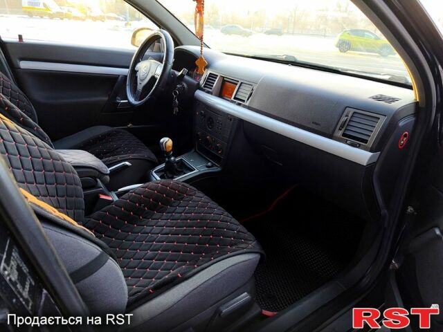 Черный Опель Вектра, объемом двигателя 2 л и пробегом 290 тыс. км за 3600 $, фото 1 на Automoto.ua