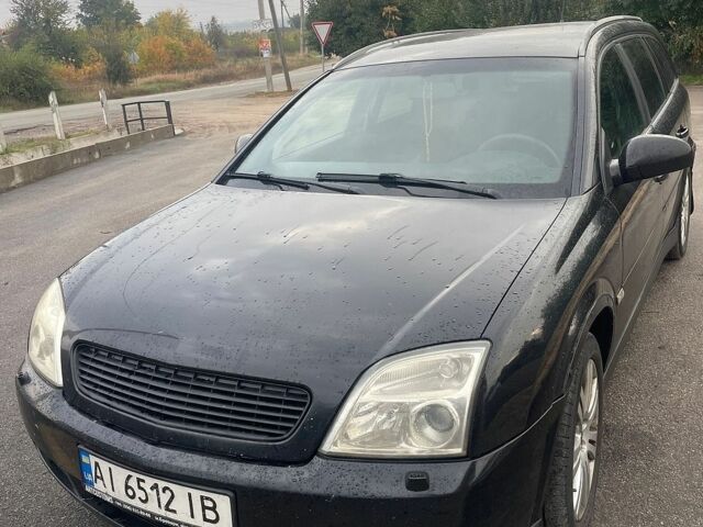 Чорний Опель Вектра, об'ємом двигуна 2 л та пробігом 299 тис. км за 4402 $, фото 2 на Automoto.ua