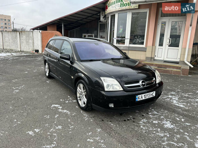 Черный Опель Вектра, объемом двигателя 2.2 л и пробегом 306 тыс. км за 3750 $, фото 6 на Automoto.ua