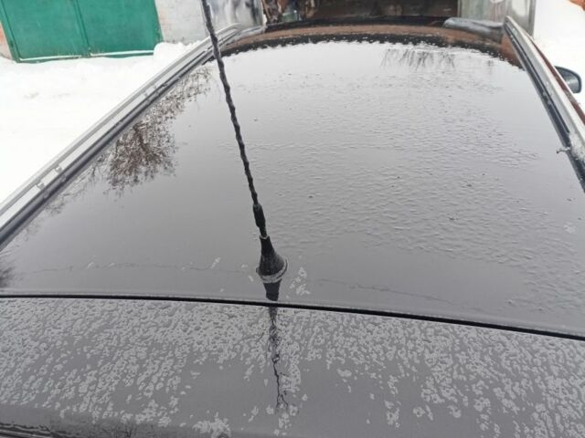 Черный Опель Вектра, объемом двигателя 2.2 л и пробегом 310 тыс. км за 3750 $, фото 4 на Automoto.ua