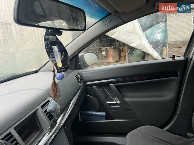 Черный Опель Вектра, объемом двигателя 2.2 л и пробегом 303 тыс. км за 3925 $, фото 7 на Automoto.ua