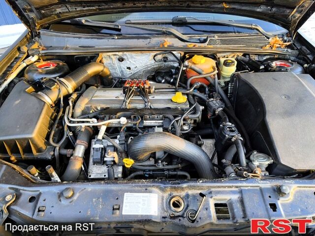 Черный Опель Вектра, объемом двигателя 2 л и пробегом 290 тыс. км за 3600 $, фото 11 на Automoto.ua