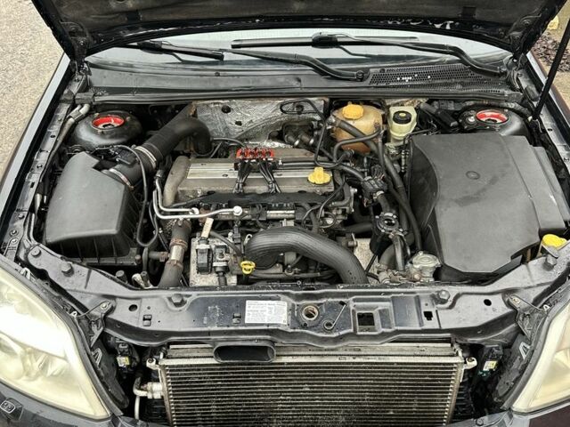 Черный Опель Вектра, объемом двигателя 2 л и пробегом 280 тыс. км за 3600 $, фото 4 на Automoto.ua