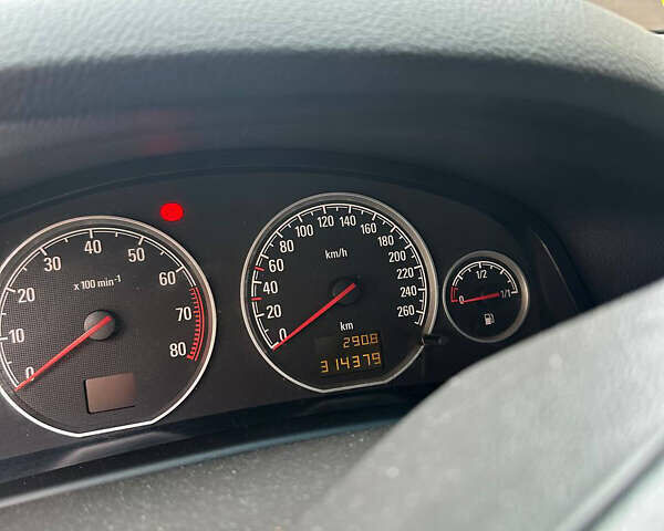 Черный Опель Вектра, объемом двигателя 2.2 л и пробегом 315 тыс. км за 5800 $, фото 7 на Automoto.ua