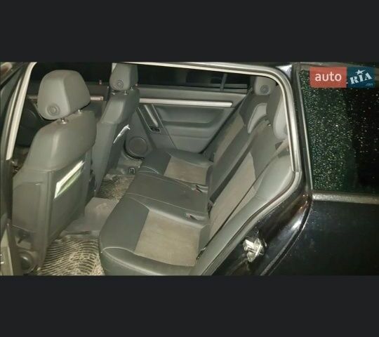 Черный Опель Вектра, объемом двигателя 1.9 л и пробегом 365 тыс. км за 4800 $, фото 5 на Automoto.ua