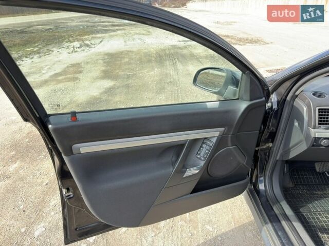 Черный Опель Вектра, объемом двигателя 2.2 л и пробегом 225 тыс. км за 6300 $, фото 39 на Automoto.ua