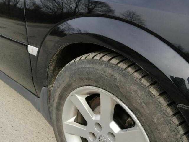 Черный Опель Вектра, объемом двигателя 1.9 л и пробегом 240 тыс. км за 6472 $, фото 7 на Automoto.ua