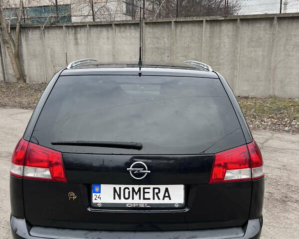 Черный Опель Вектра, объемом двигателя 1.9 л и пробегом 262 тыс. км за 7000 $, фото 1 на Automoto.ua