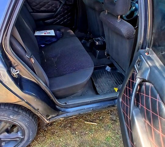 Черный Опель Вектра, объемом двигателя 16 л и пробегом 390 тыс. км за 1300 $, фото 1 на Automoto.ua