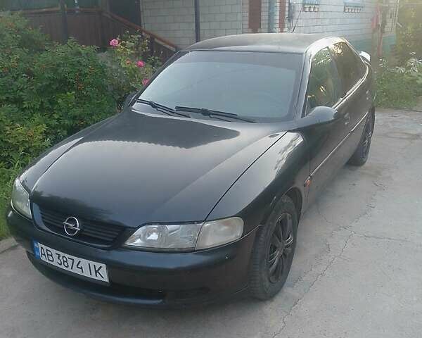 Черный Опель Вектра, объемом двигателя 1.8 л и пробегом 250 тыс. км за 2500 $, фото 1 на Automoto.ua