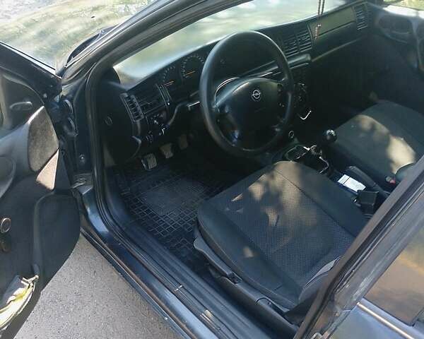 Черный Опель Вектра, объемом двигателя 1.8 л и пробегом 250 тыс. км за 2500 $, фото 7 на Automoto.ua