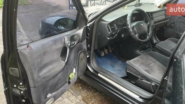 Чорний Опель Вектра, об'ємом двигуна 2 л та пробігом 414 тис. км за 3000 $, фото 8 на Automoto.ua