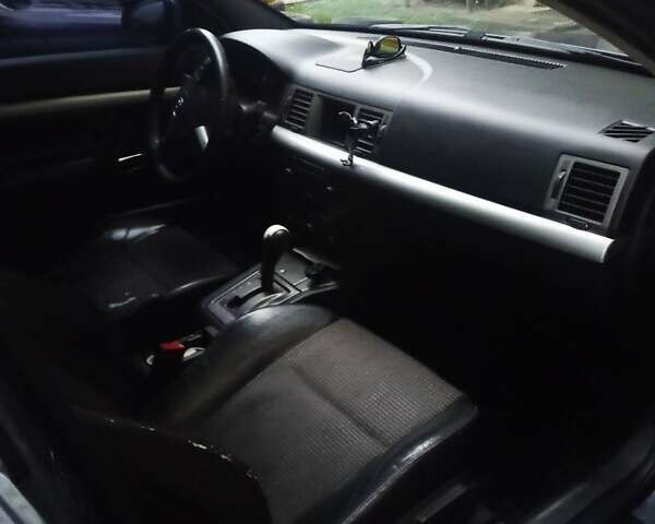 Черный Опель Вектра, объемом двигателя 2.2 л и пробегом 395 тыс. км за 4800 $, фото 5 на Automoto.ua