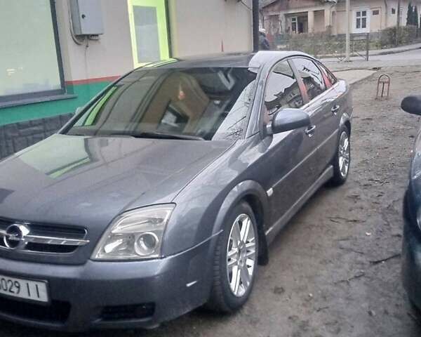 Черный Опель Вектра, объемом двигателя 2.2 л и пробегом 395 тыс. км за 4800 $, фото 1 на Automoto.ua