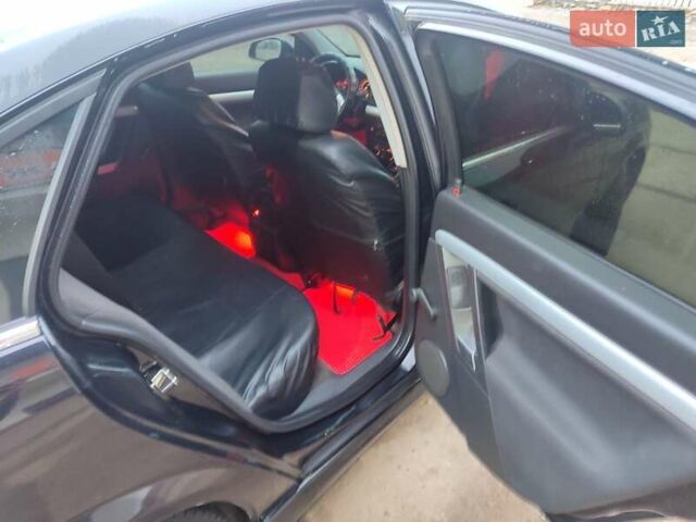 Черный Опель Вектра, объемом двигателя 2.2 л и пробегом 351 тыс. км за 3950 $, фото 4 на Automoto.ua