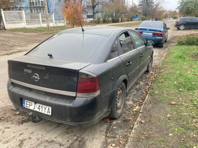 Черный Опель Вектра, объемом двигателя 1.9 л и пробегом 318 тыс. км за 1786 $, фото 3 на Automoto.ua