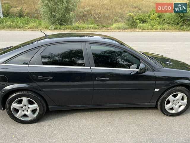 Черный Опель Вектра, объемом двигателя 2.2 л и пробегом 283 тыс. км за 6610 $, фото 5 на Automoto.ua