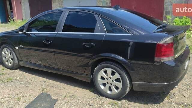 Черный Опель Вектра, объемом двигателя 1.9 л и пробегом 318 тыс. км за 6600 $, фото 9 на Automoto.ua