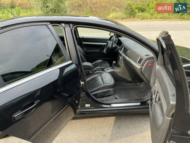Черный Опель Вектра, объемом двигателя 2.2 л и пробегом 283 тыс. км за 6610 $, фото 3 на Automoto.ua
