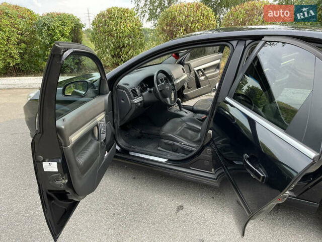 Черный Опель Вектра, объемом двигателя 2.2 л и пробегом 283 тыс. км за 6610 $, фото 9 на Automoto.ua