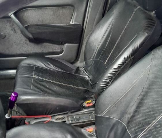 Фиолетовый Опель Вектра, объемом двигателя 2 л и пробегом 299 тыс. км за 1450 $, фото 7 на Automoto.ua