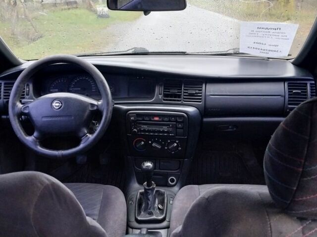 Фиолетовый Опель Вектра, объемом двигателя 2 л и пробегом 250 тыс. км за 1350 $, фото 6 на Automoto.ua