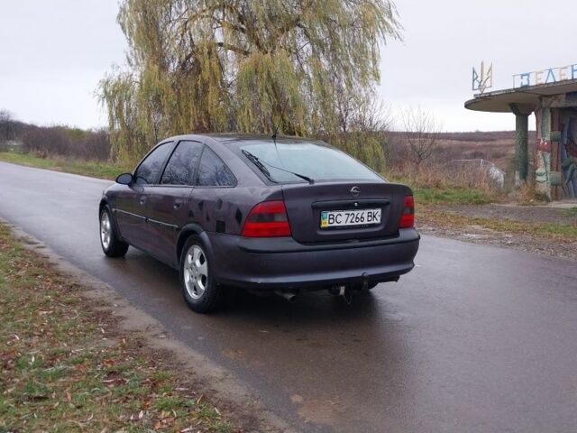 Фиолетовый Опель Вектра, объемом двигателя 2 л и пробегом 250 тыс. км за 1350 $, фото 4 на Automoto.ua