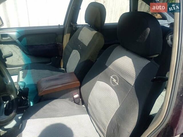 Фиолетовый Опель Вектра, объемом двигателя 2 л и пробегом 244 тыс. км за 1500 $, фото 2 на Automoto.ua