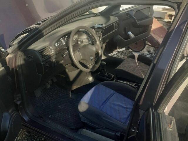 Фіолетовий Опель Вектра, об'ємом двигуна 2 л та пробігом 100 тис. км за 1300 $, фото 7 на Automoto.ua