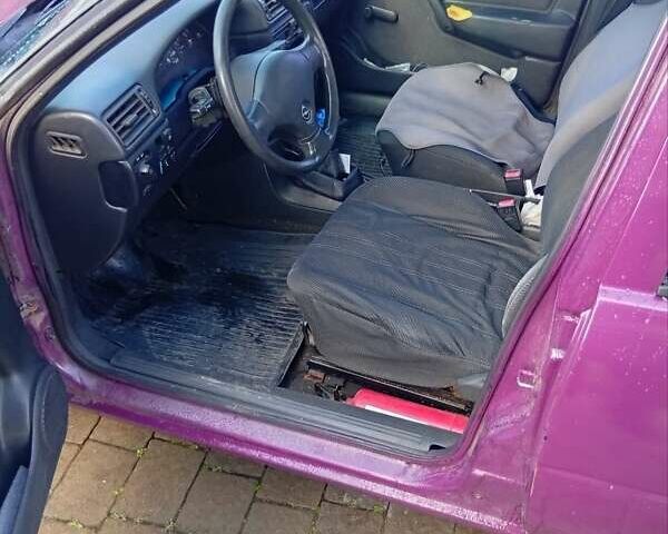 Фиолетовый Опель Вектра, объемом двигателя 1.6 л и пробегом 338 тыс. км за 700 $, фото 16 на Automoto.ua