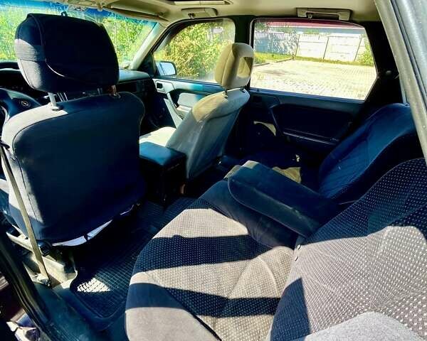 Фіолетовий Опель Вектра, об'ємом двигуна 1.8 л та пробігом 230 тис. км за 1350 $, фото 12 на Automoto.ua
